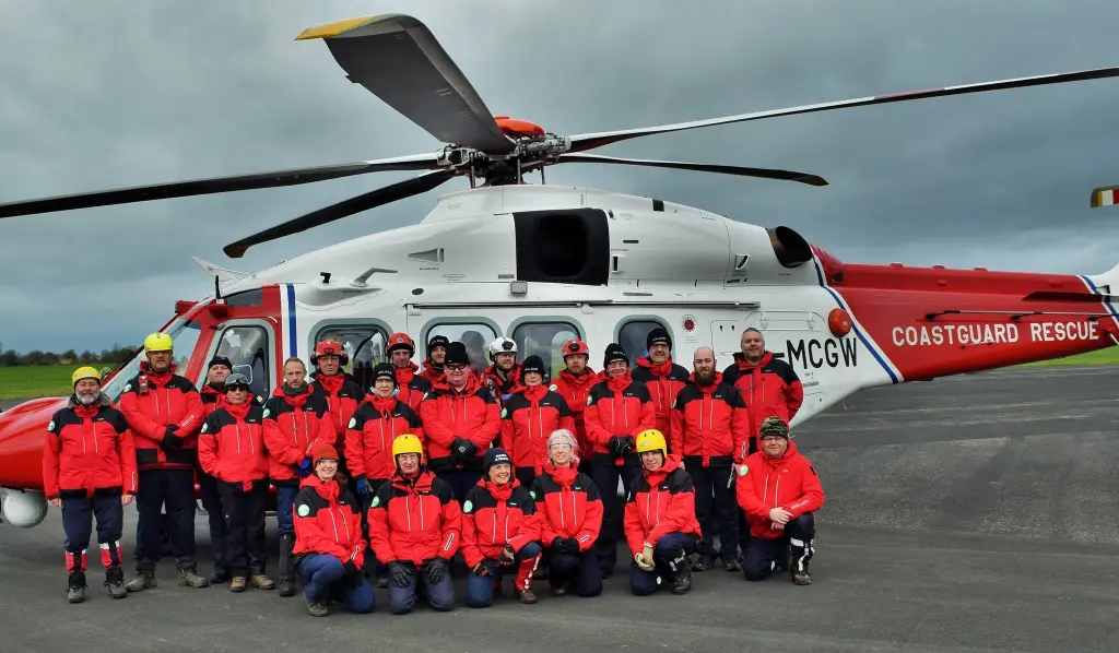 The Wiltshire Search and Rescue team with a Coastguard helicopter